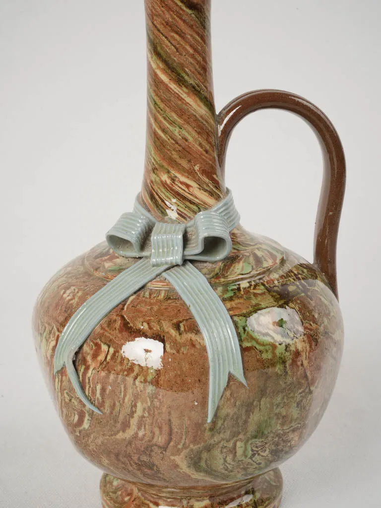 Early 20th French Marbled Glazed Pitcher with Decorative Bow, 11"